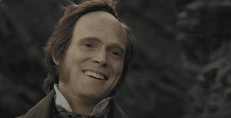 Paul Bettany as  Charles Darwin in Creation in suit smiling