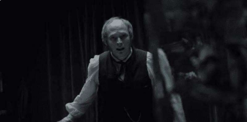 Paul Bettany as  Charles Darwin in Creation speaking at someone in vest
