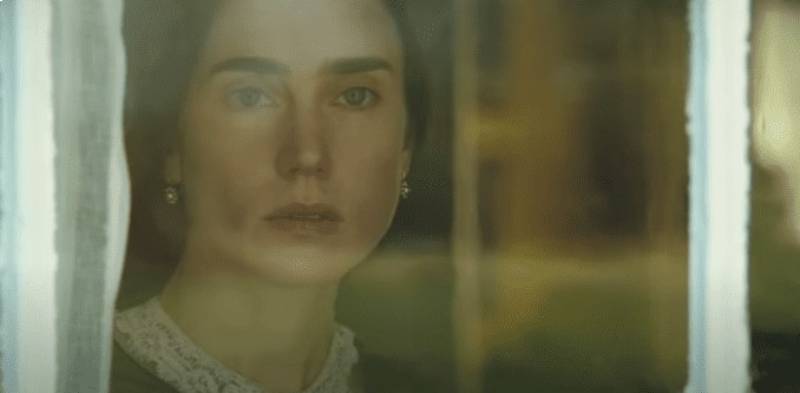 Jennifer Connelly as  Emma Darwin In Creation looking through a window   in dress