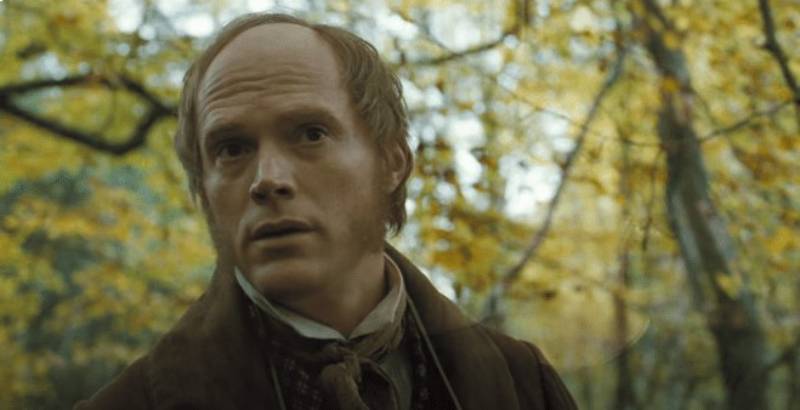 Paul Bettany as  Charles Darwin in Creation in nature wearing brown suit
