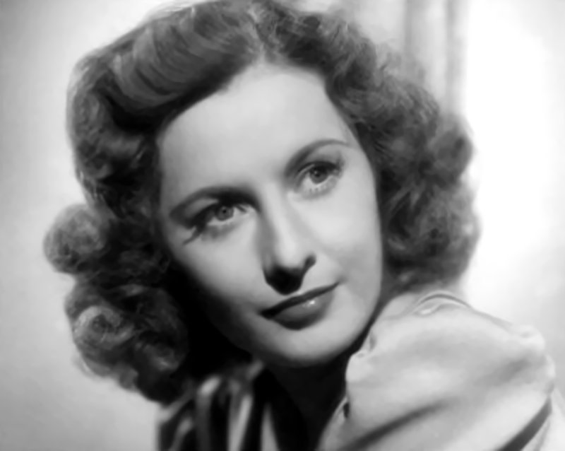 Publicity photo of Barbara Stanwyck in dress