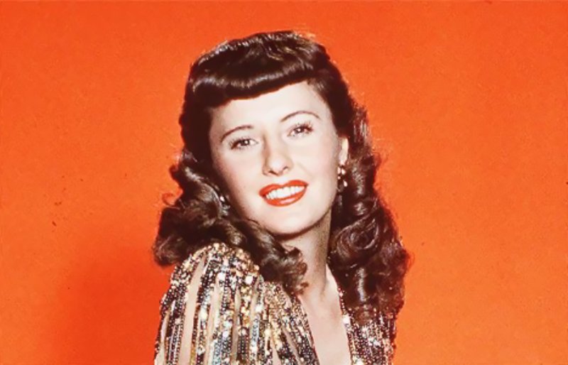 Barbara Stanwyck in Ball of Fire in golden dress