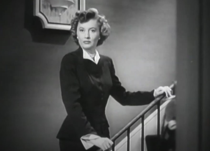 Barbara Stanwyck in East Side, West Side in black suit