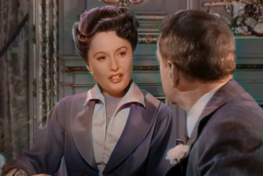 Barbara Stanwyck on Titanic   in blue dress