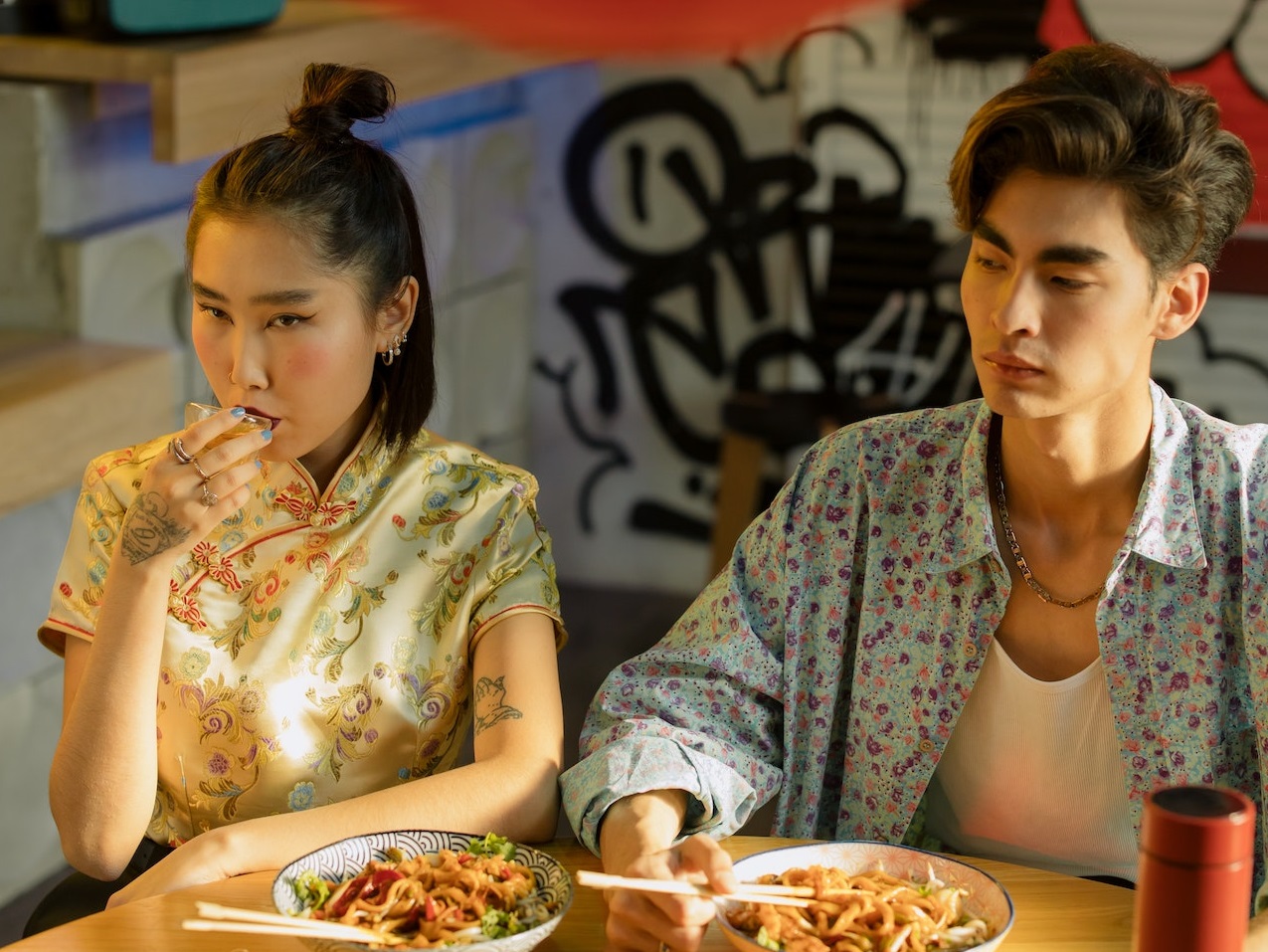 Asian couple are having a lunch.
