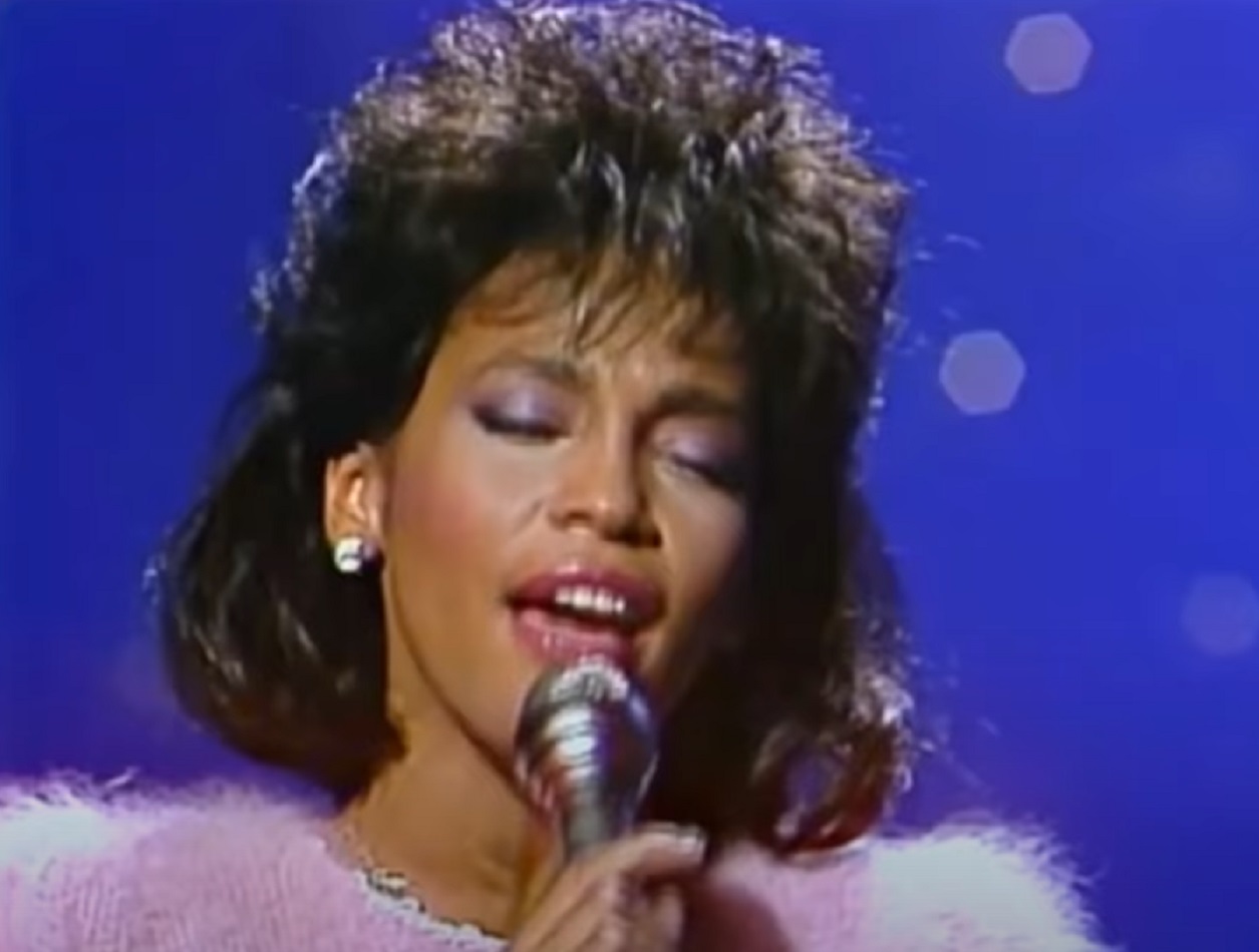 Screenshot of Whitney Houston performing live on stage - from Whitney (2018)