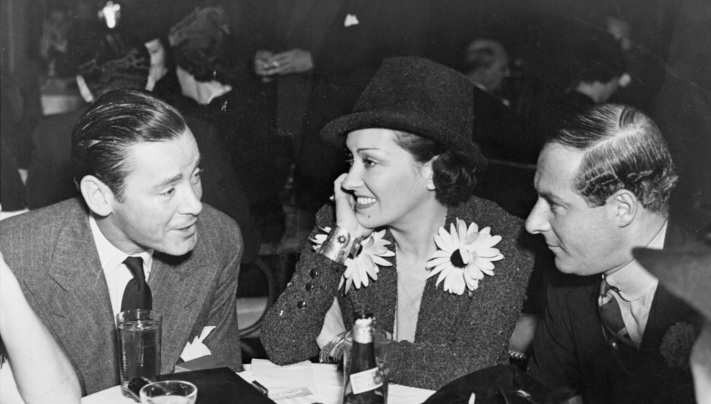 George Jessell and friends  talk over a drink