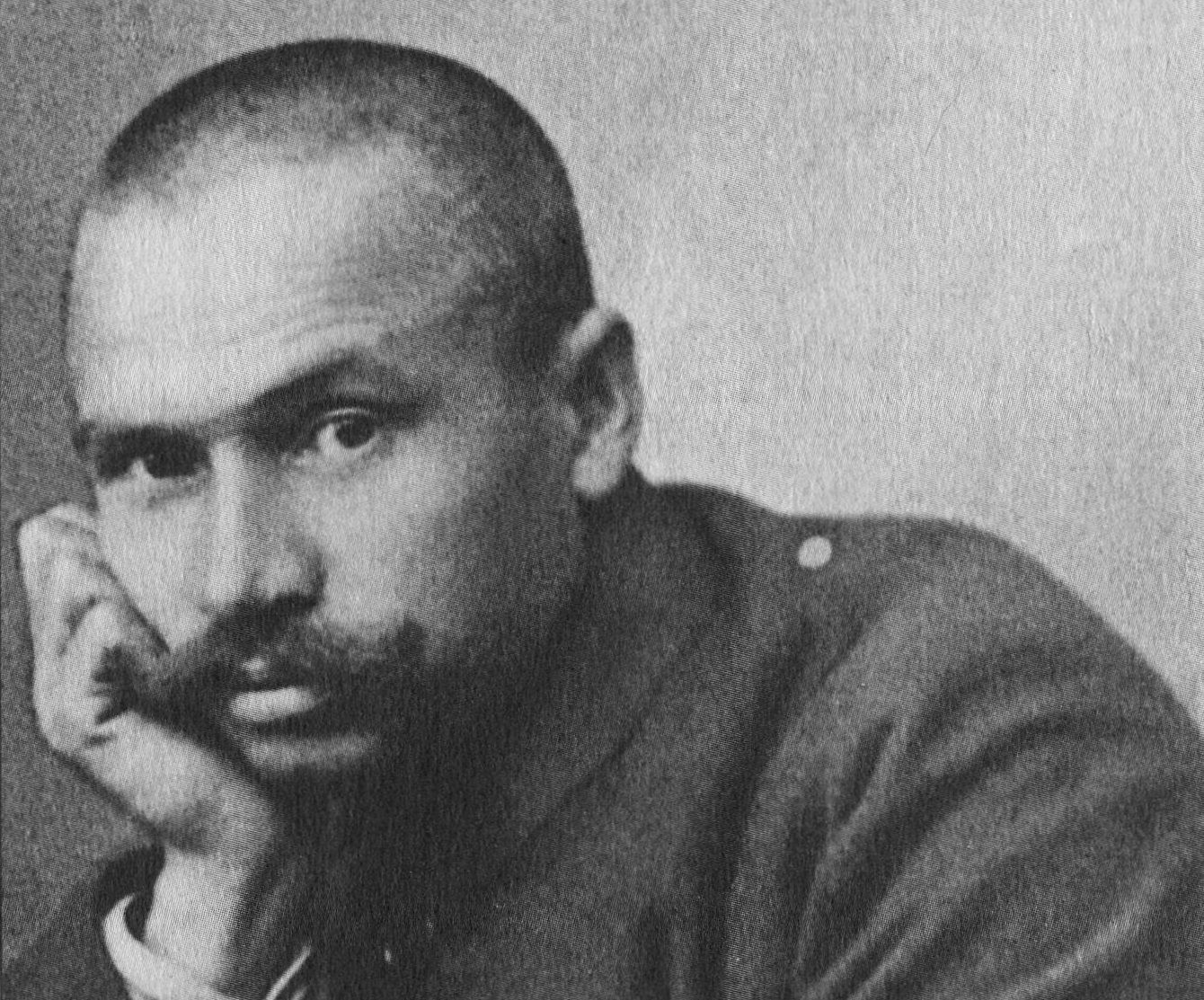 Gawriil Iljitsch Mjasnikow seating and looking at camera - 1922