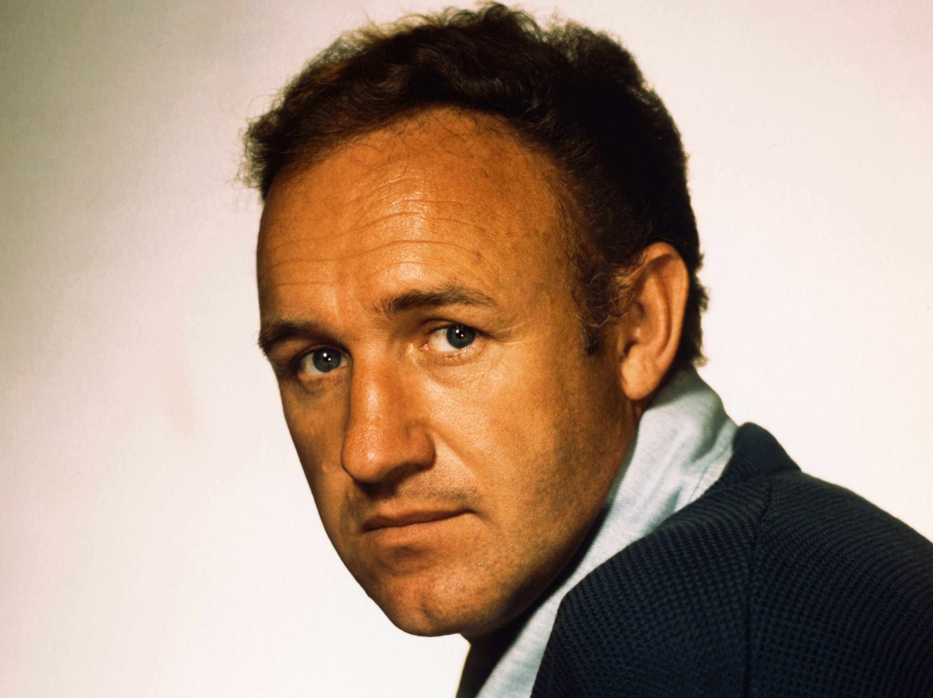 Portrait of Gene Hackman in blue sweater