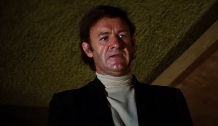 Gene Hackman in  The Poseidon Adventure, wearing jacket and turtlenecks