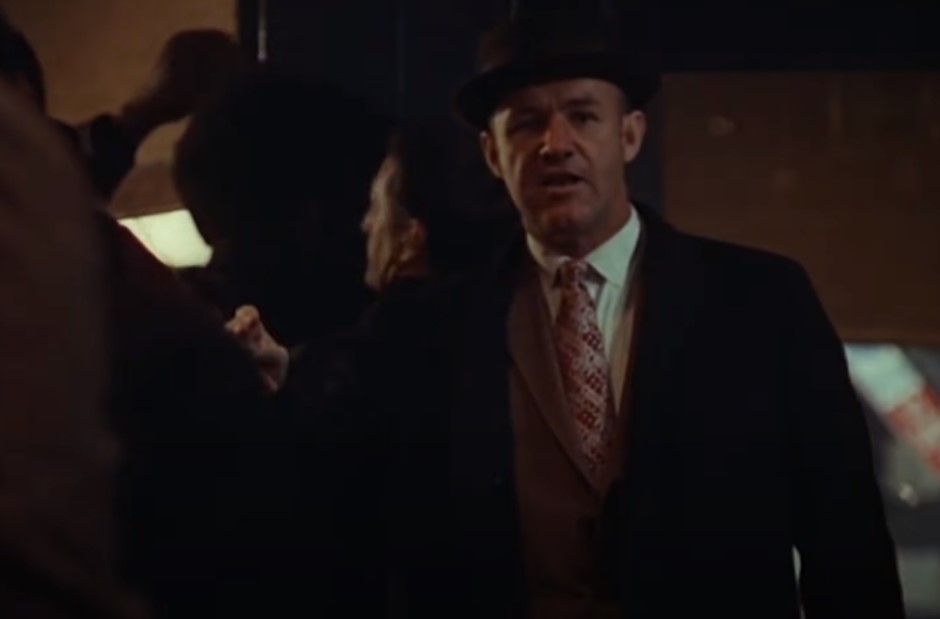 Gene Hackman in The French Connection, in suit and hat