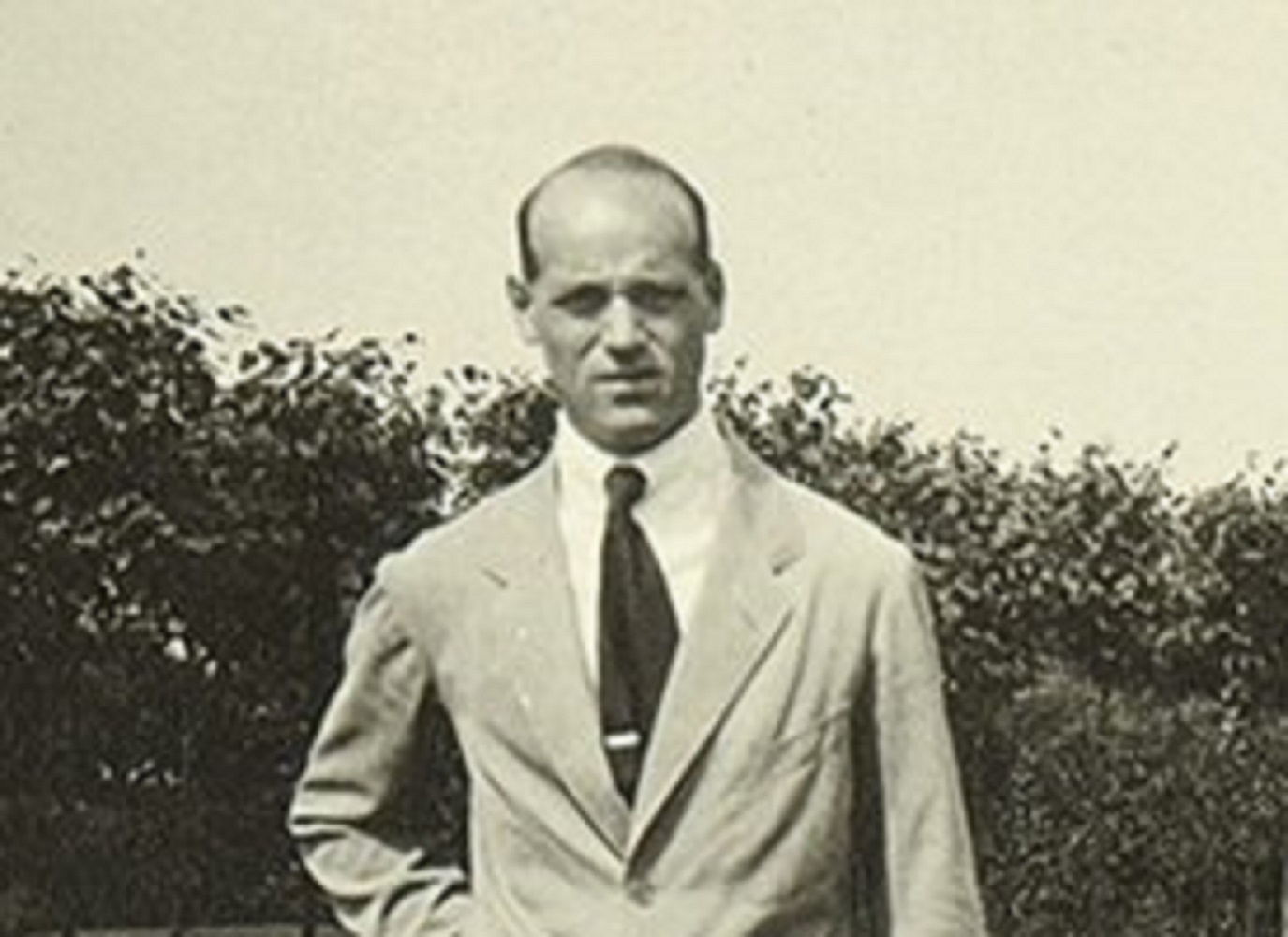 Grand Duke Mikhail Alexandrovich Romanov wearing grey suit is standing outside and looking at camera - circa 1912-1914