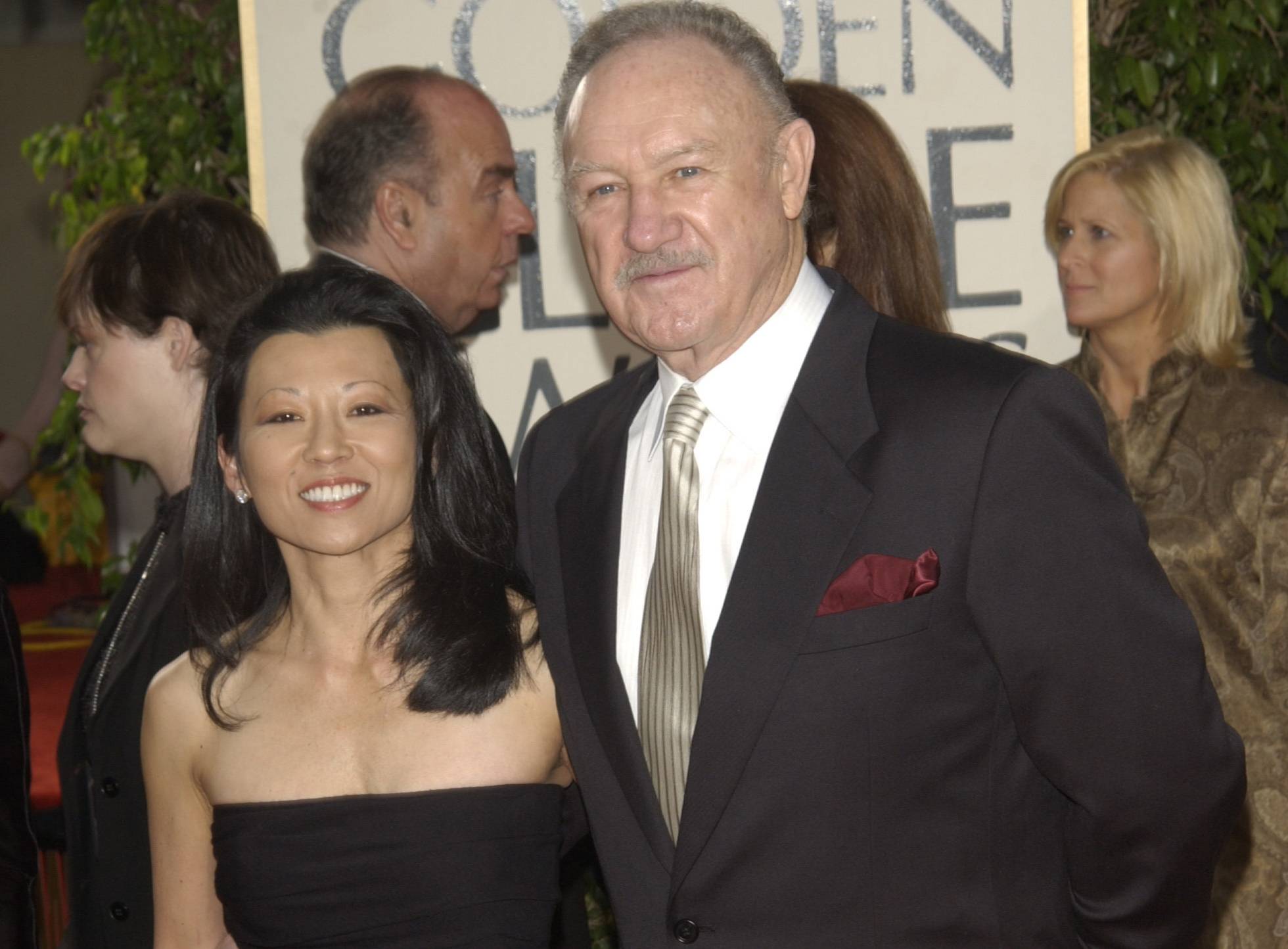 GENE HACKMAN & wife at the Golden Globe Awards at the Beverly Hills Hilton Hotel. 19JAN2003 in formal clothes