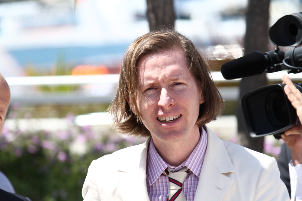 Wes Anderson poses at the 'Moonrise Kingdom' photocall during the 65th Annual Cannes Film Festival at Palais des Festivals on May 16, 2012 in Cannes, France in light suit