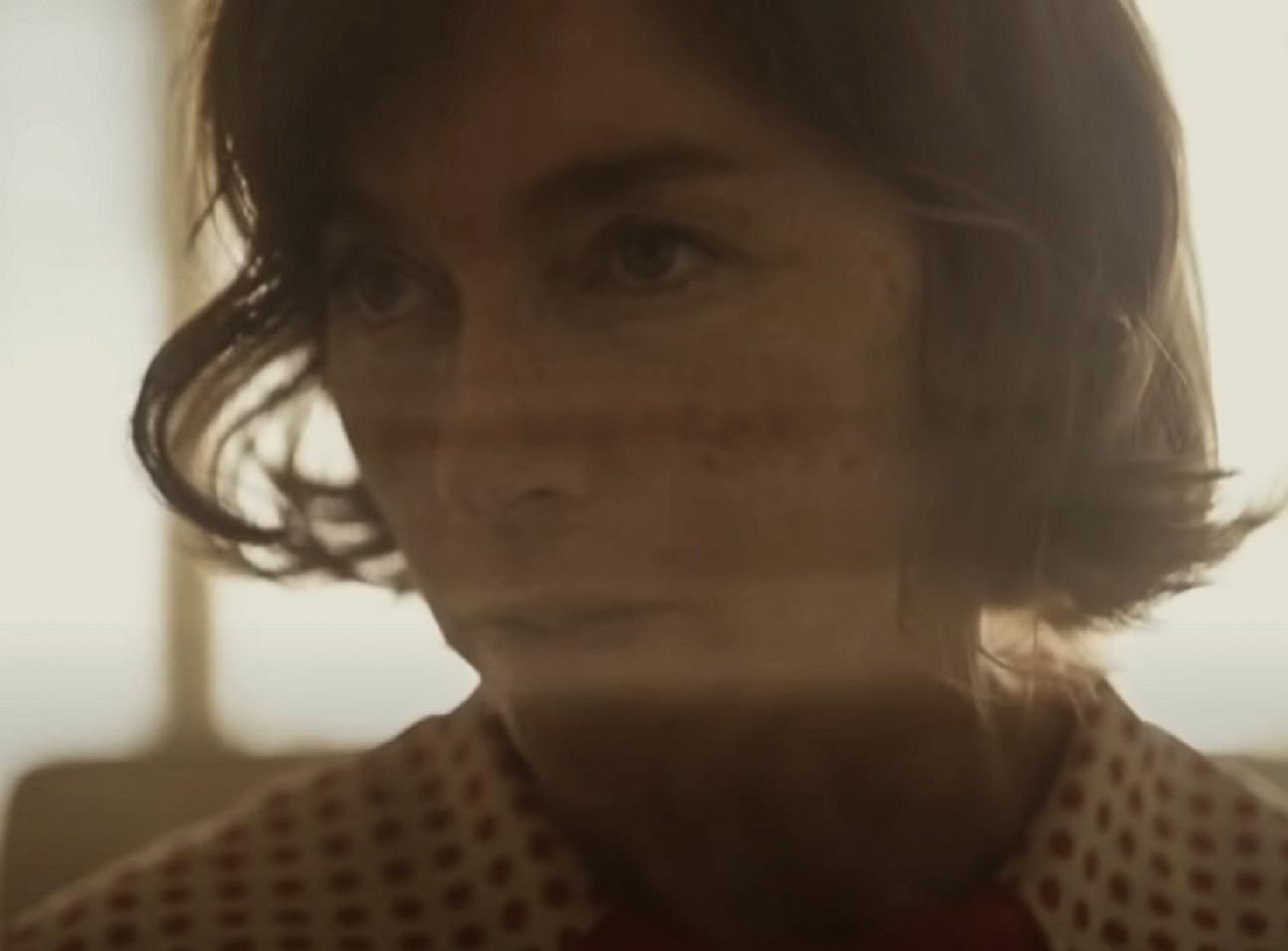 Screenshot: Gladys Pearl Baker (Julianne Nicholson) is looking at side upset - from Blonde (2022)