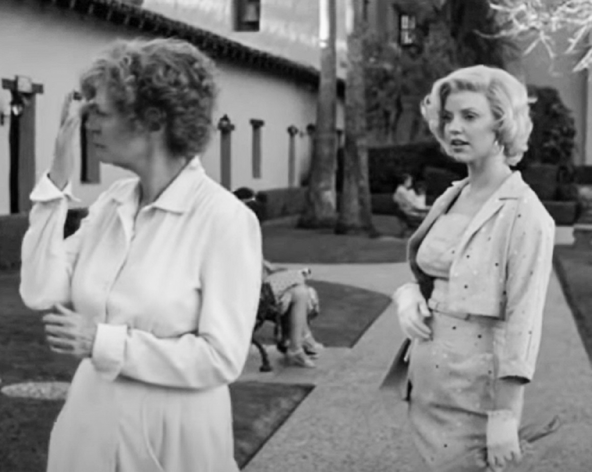 Screenshot: Gladys Pearl Baker (Susan Sarandon)  is standing outside with upset face - from The Secret Life of Marilyn Monroe (2015)