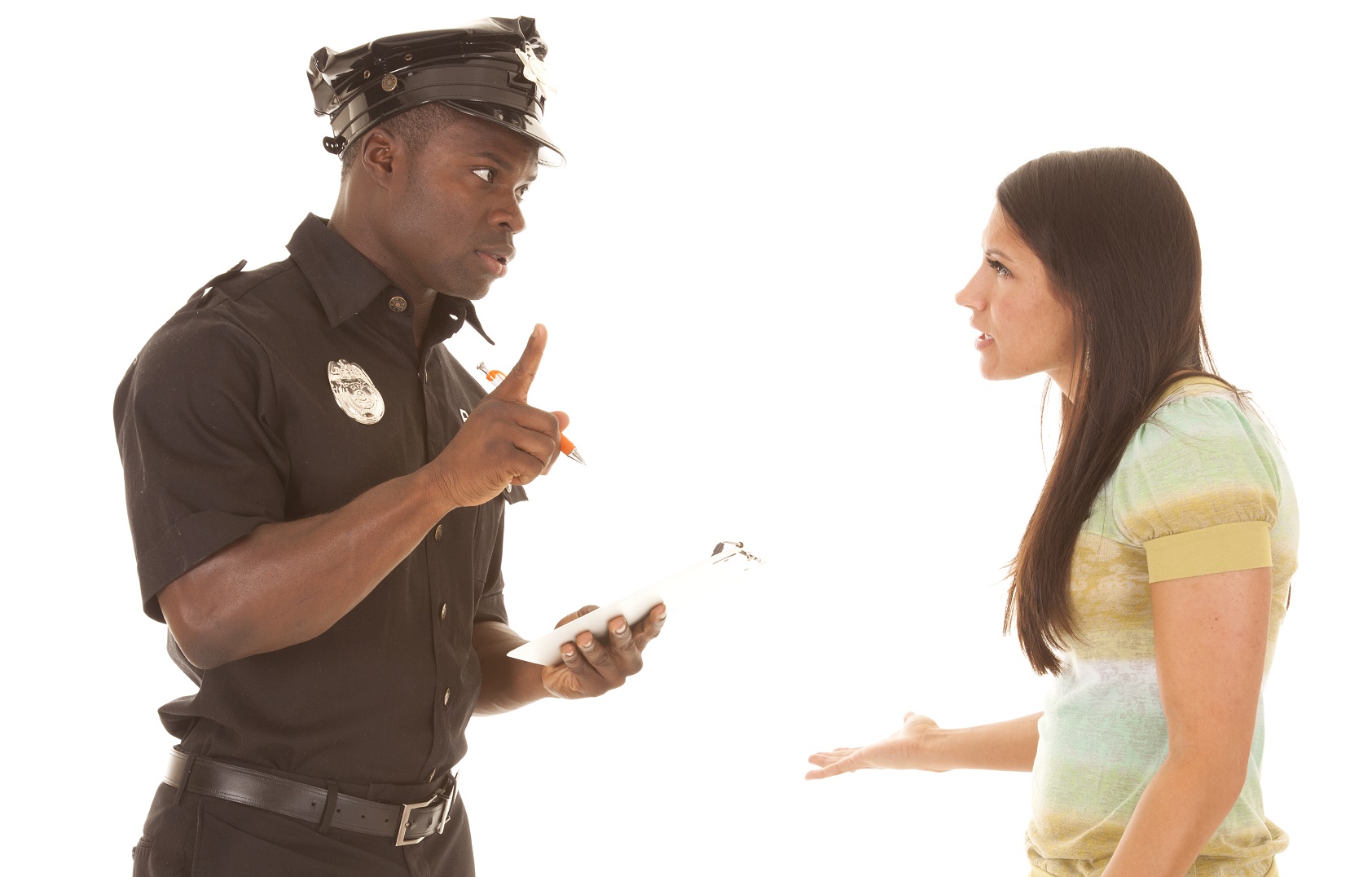 Young woman is arguing with police officer wearing uniform.