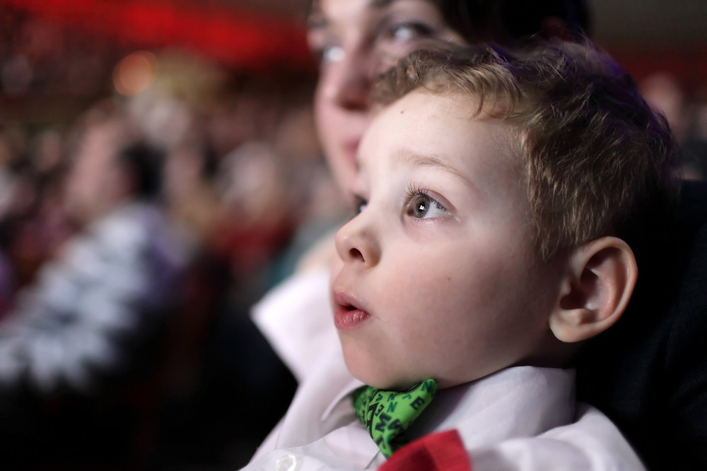Portrait of astonished child at a circus