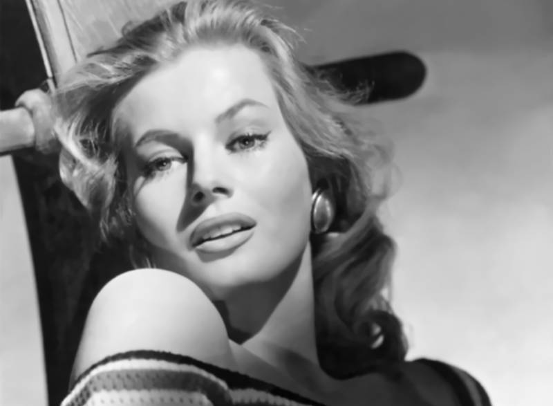 Anita Ekberg in knitted top and earrings