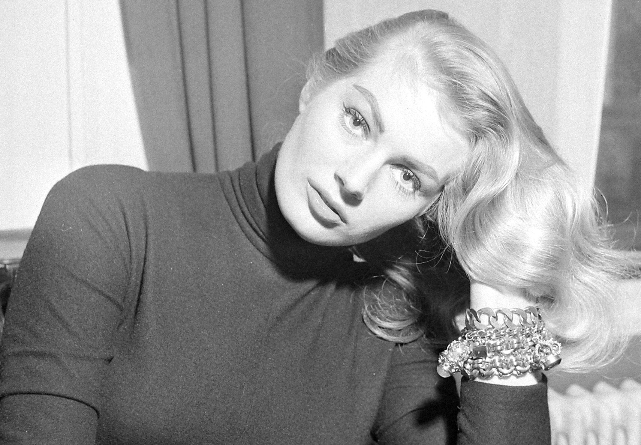 Actress Anita Ekberg in dark turtleneck and  bracelets