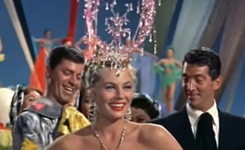 anita ekberg in artists and models 1955 with crown on  head