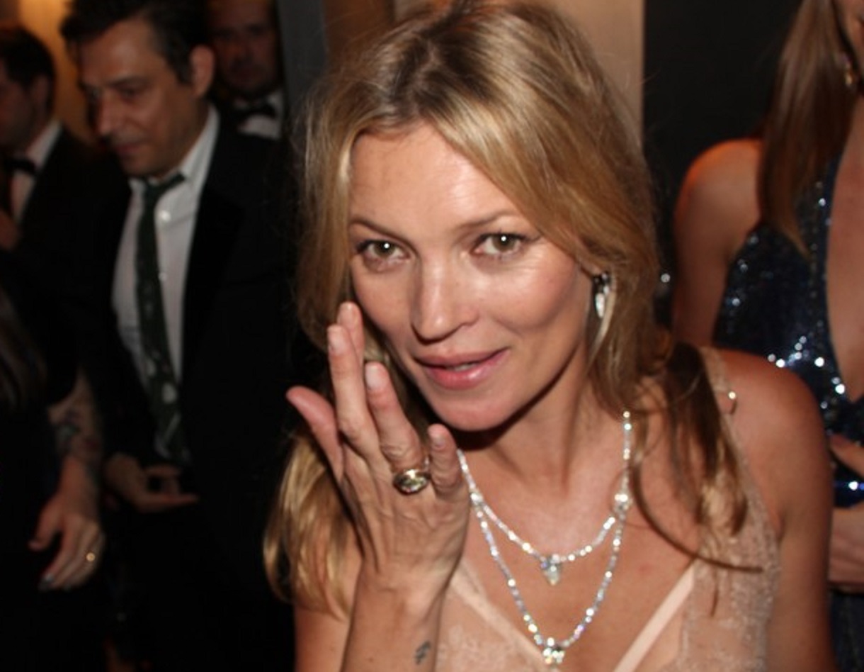 Kate Moss wearing pink dress is looking at camera - 2015