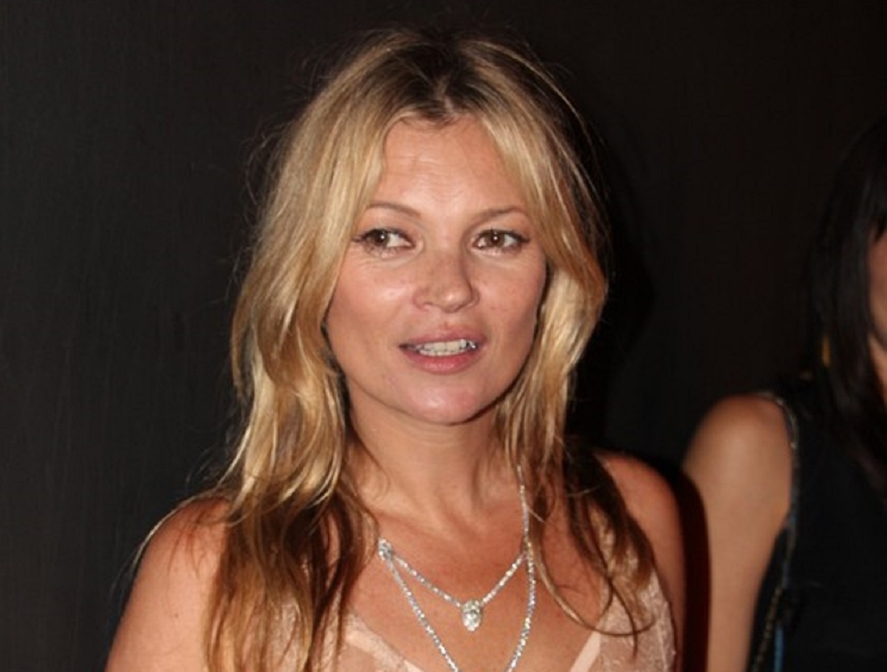 Kate Moss wearing pink dress is smiling - 2015