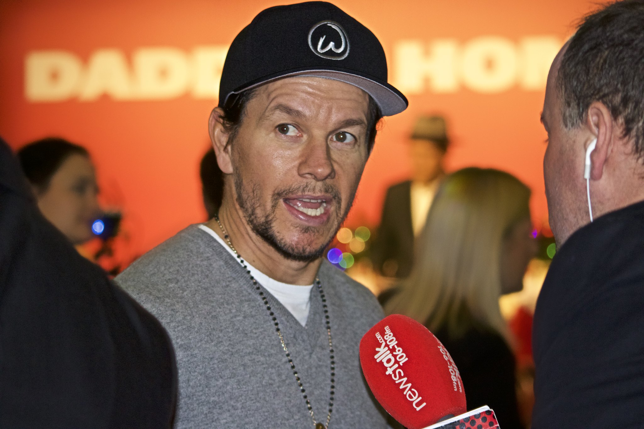 Mark Wahlberg is talking outside to microphone - 2017