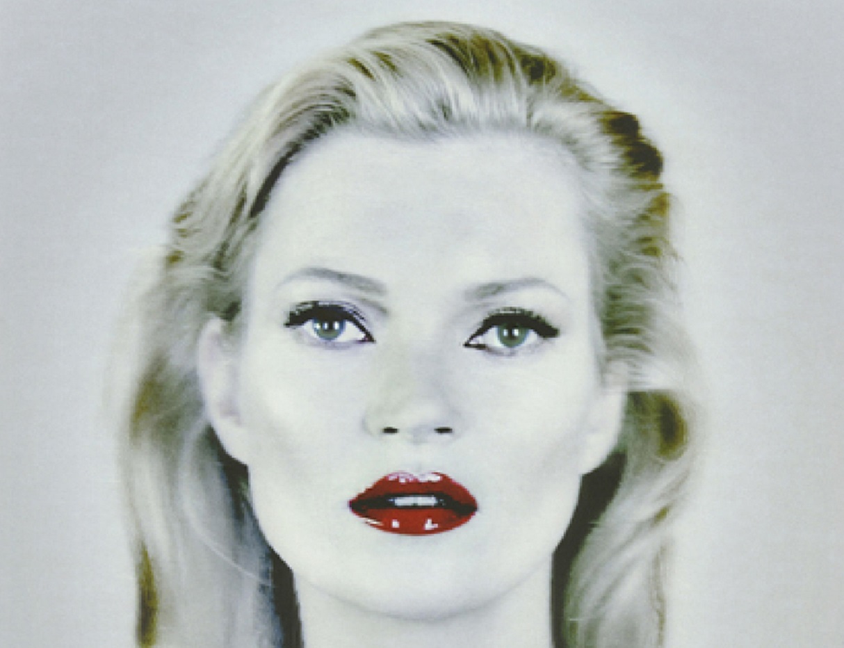 Portrait of Kate Moss wearing dark red lipstick and looking at camera - 2015