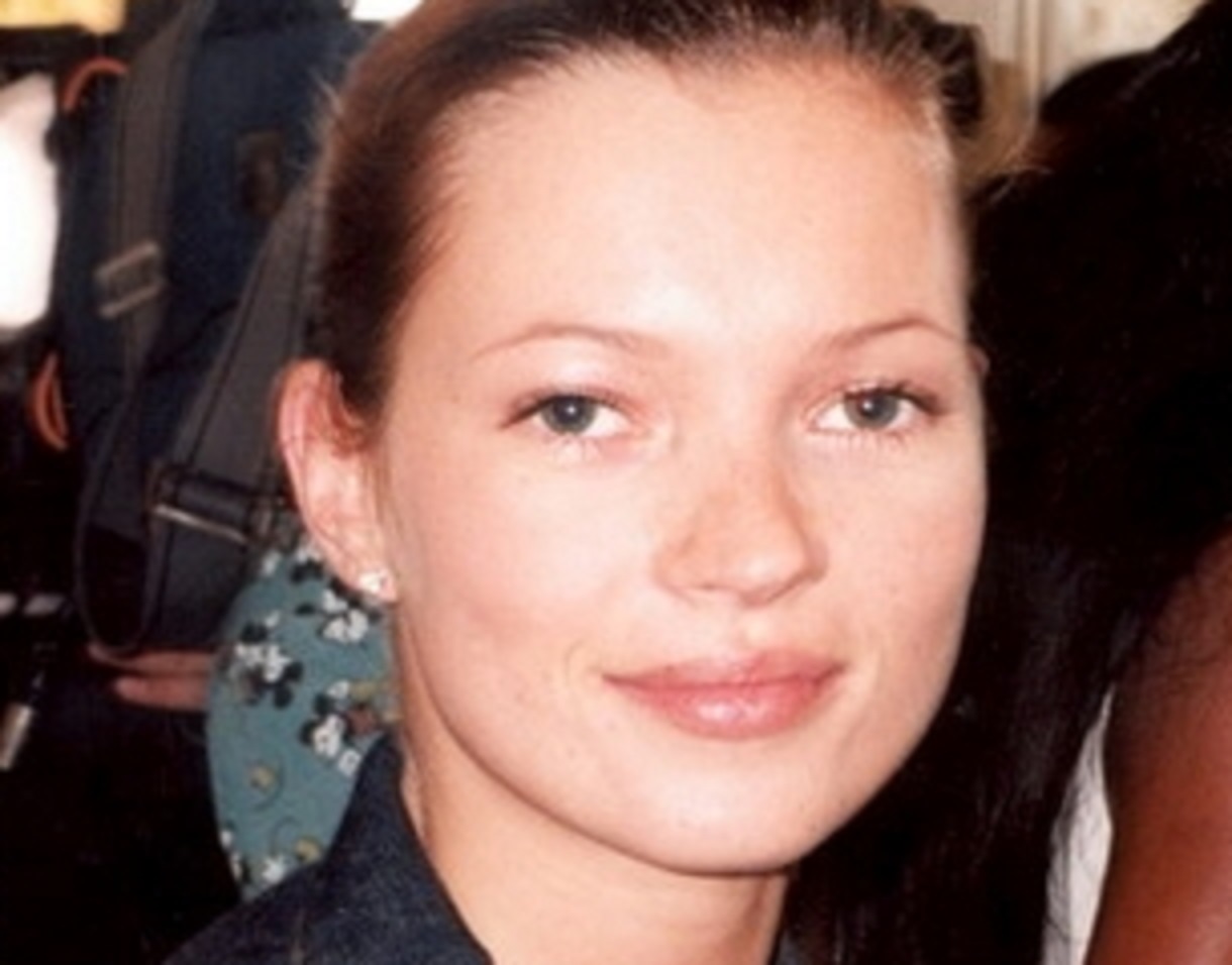 Kate Moss wearing blue denim jacket is looking at camera - 2005