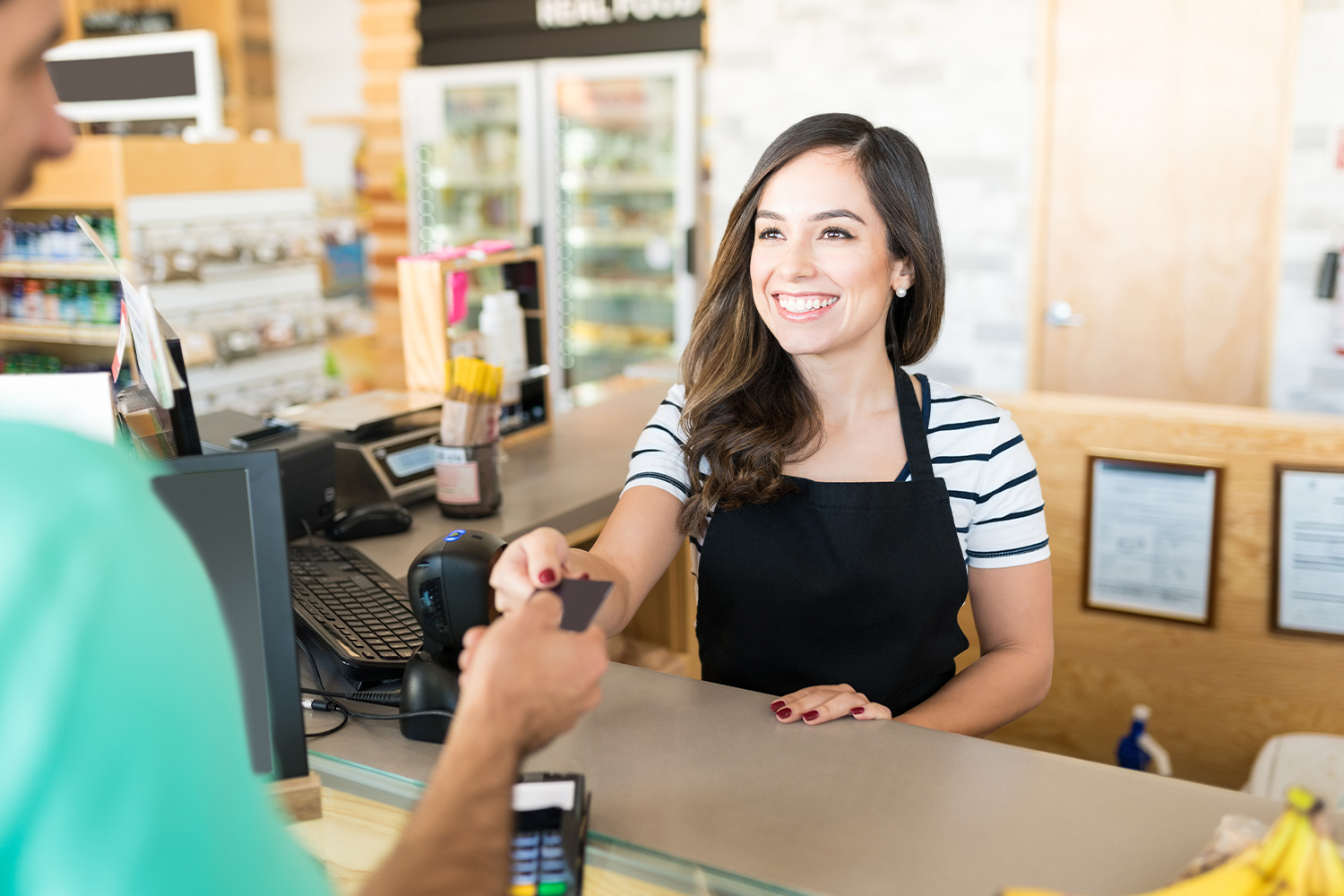 Cashier Taking A Card