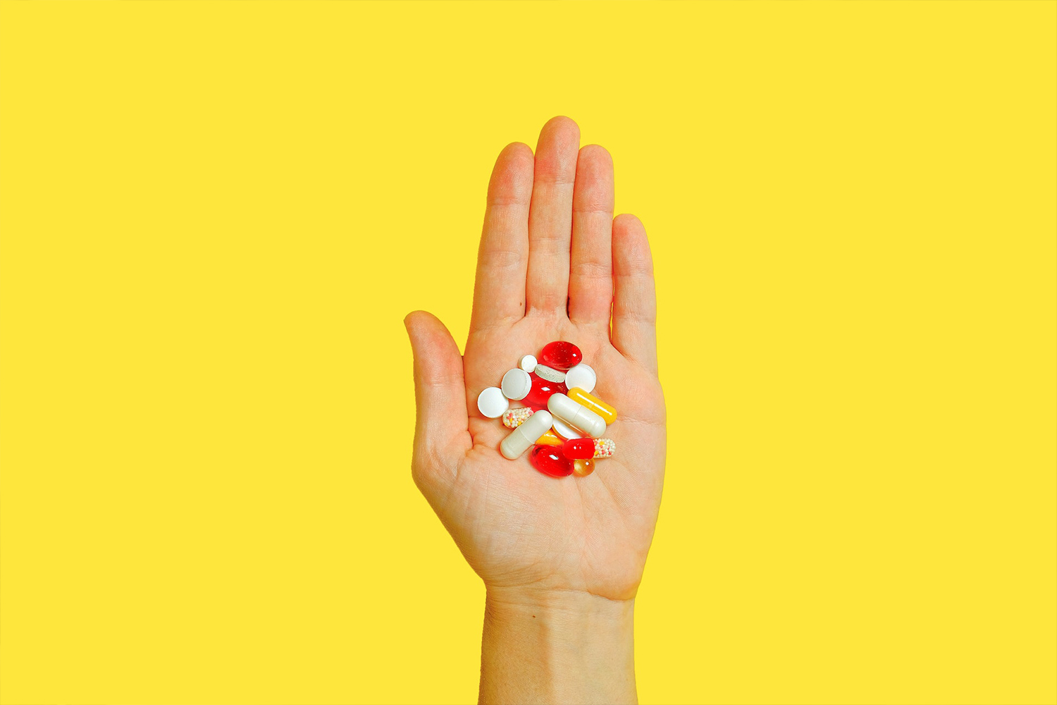 Hand Holding Pills