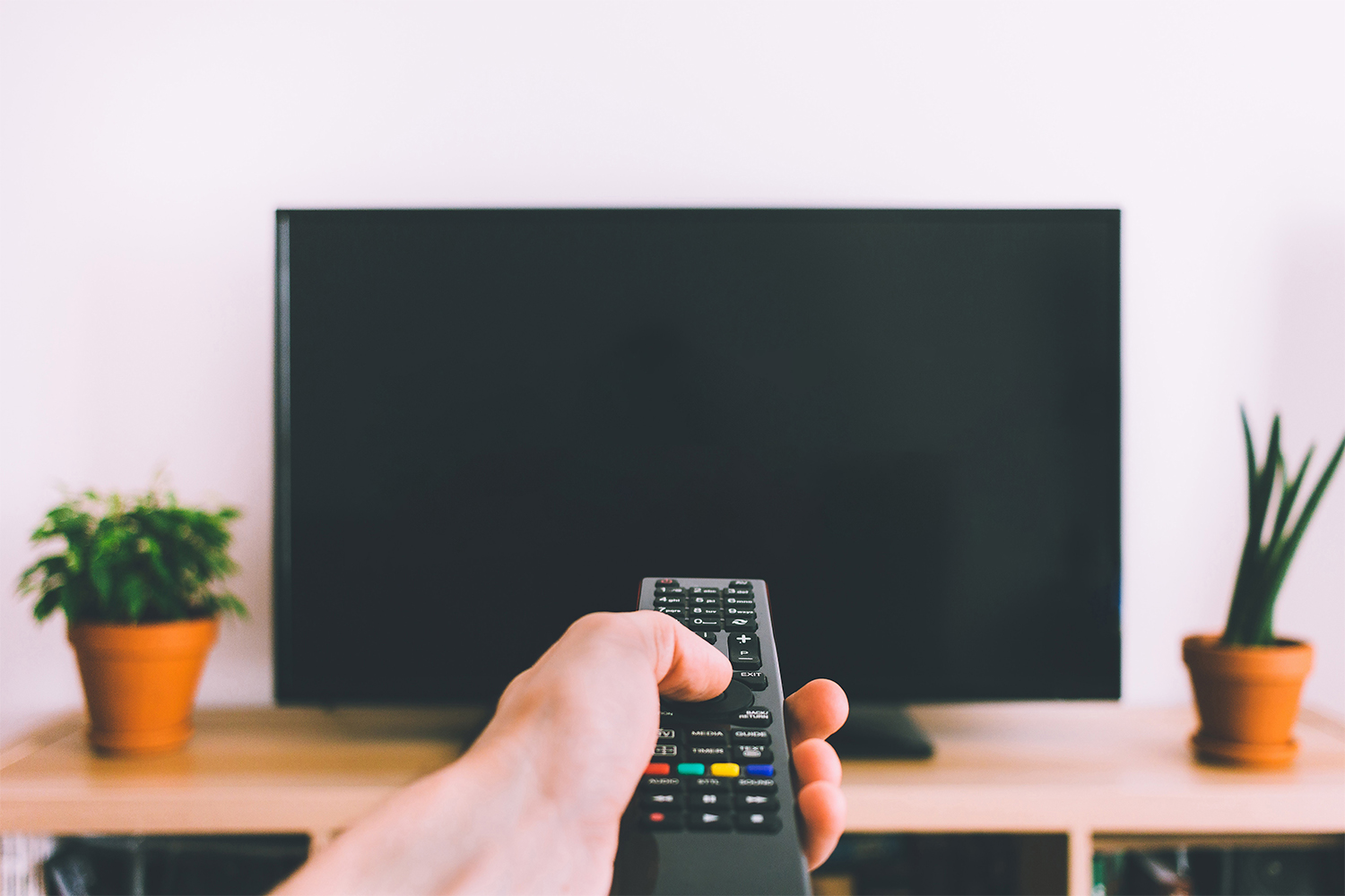 Pointing A Remote At A Television