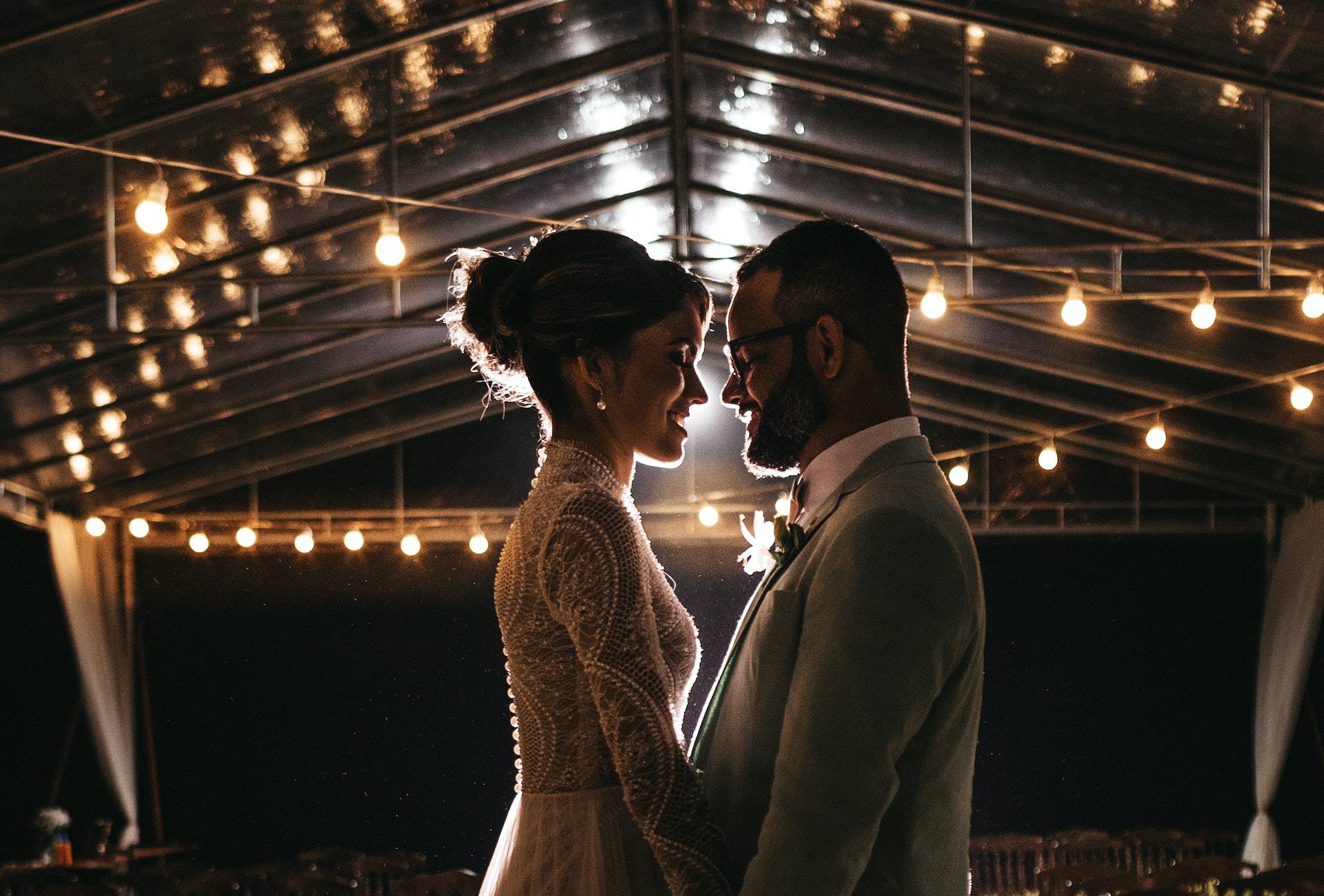 happy couple at their wedding standing alone