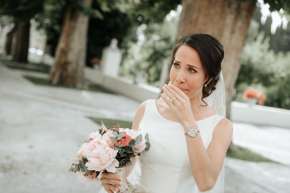 Beautiful gorgeous brunet bride crying