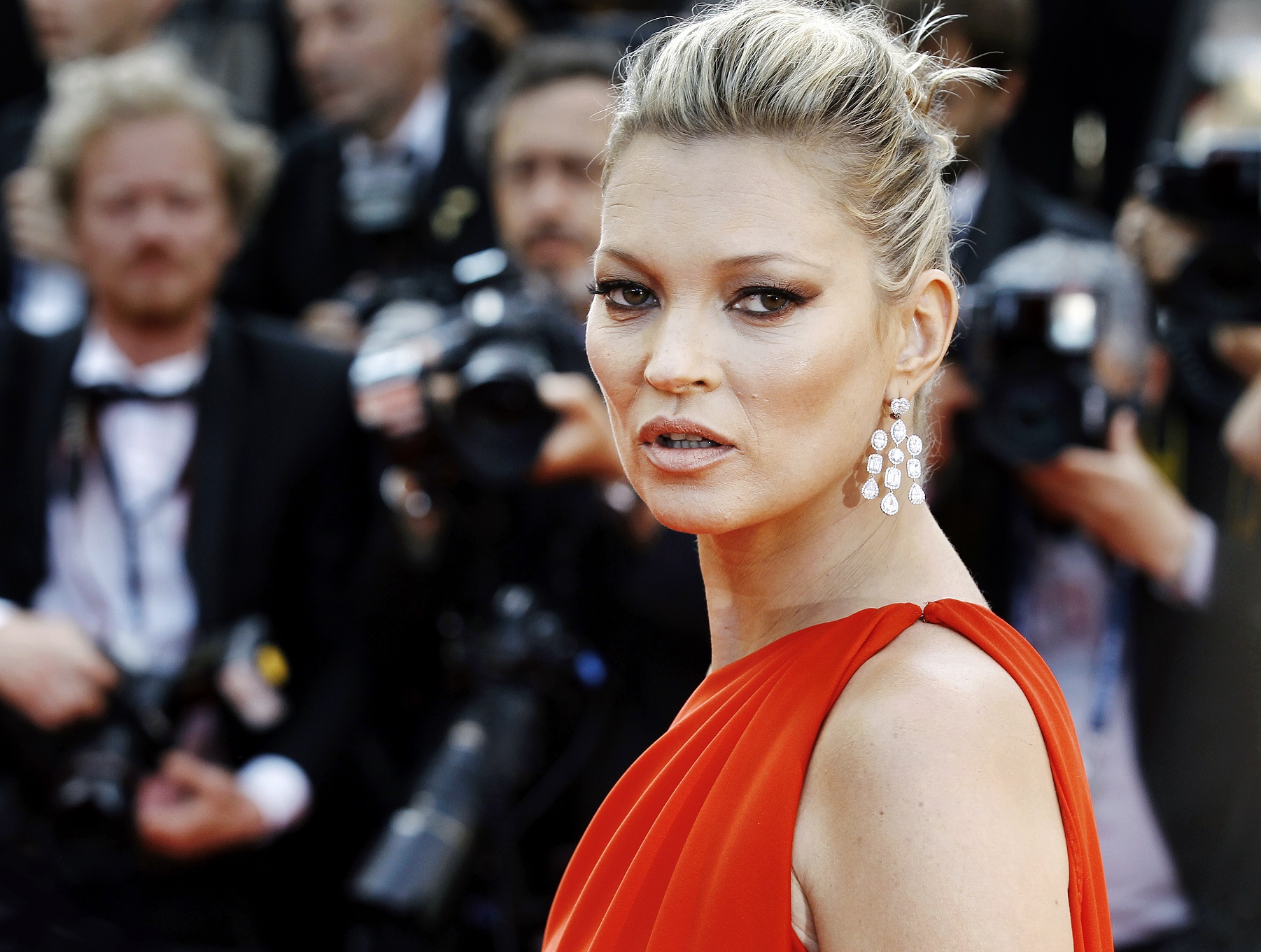 Kate Moss wearing red dress and earrings - 2016