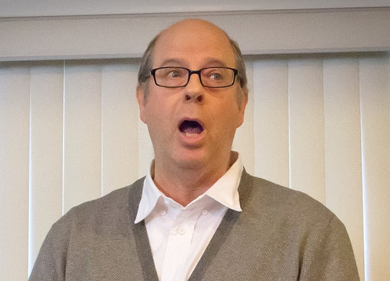 Stephen Tobolowsky is looking at side and talking - 2013