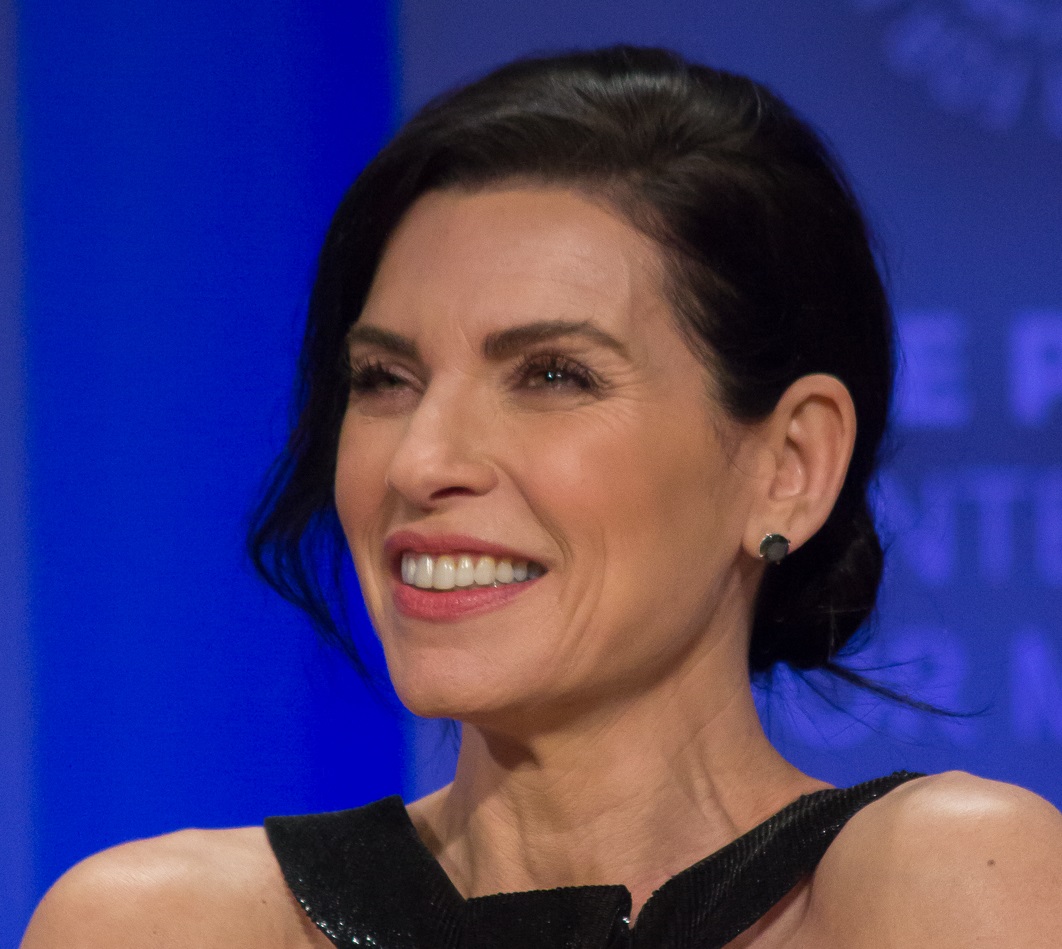 Julianna Margulies is looking ta side and smiling - 2015