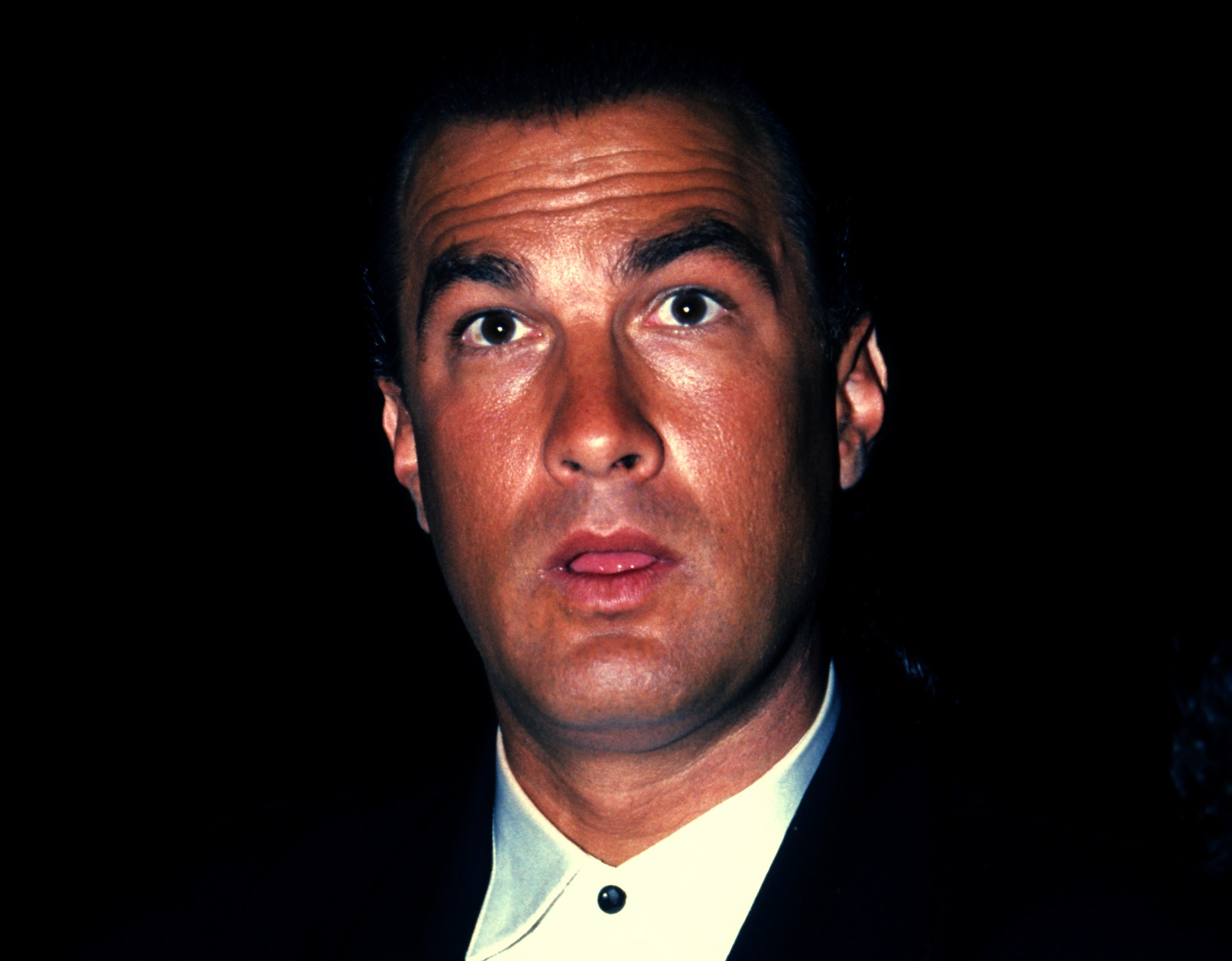 Steven Seagal is looking surprised at camera - 1991