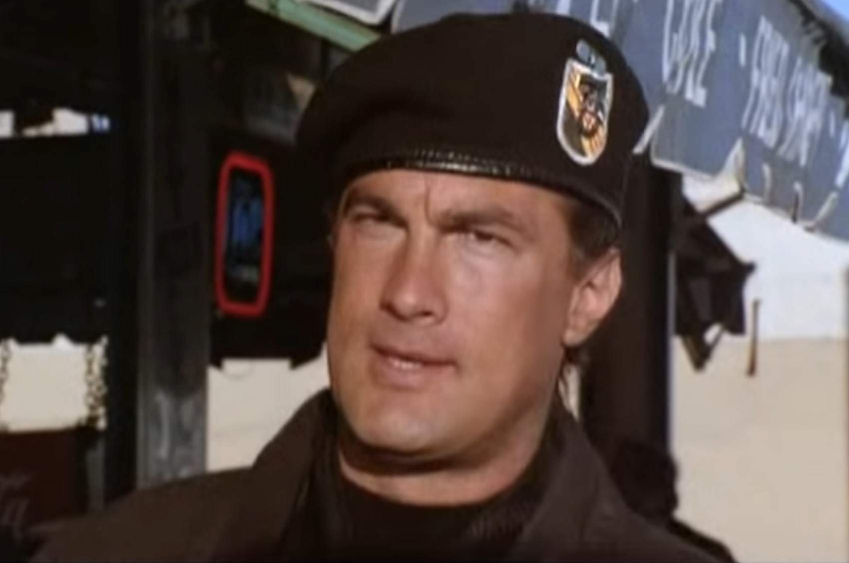 Screenshot: Steven Seagal wearing black military uniform - from Out For Justice (1991)