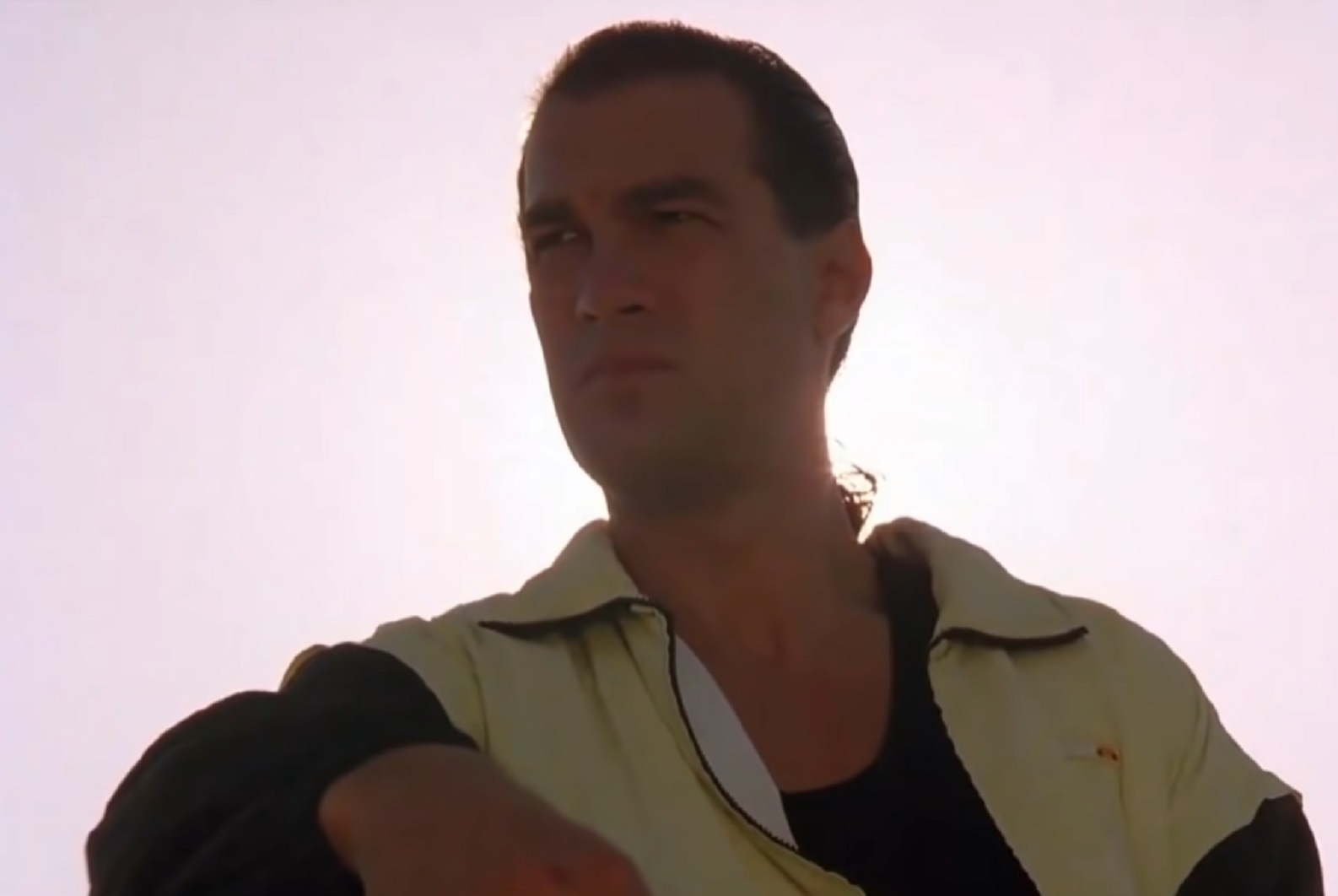 Screenshot: Steven Seagal looking at side - from Hard To Kill (1990)