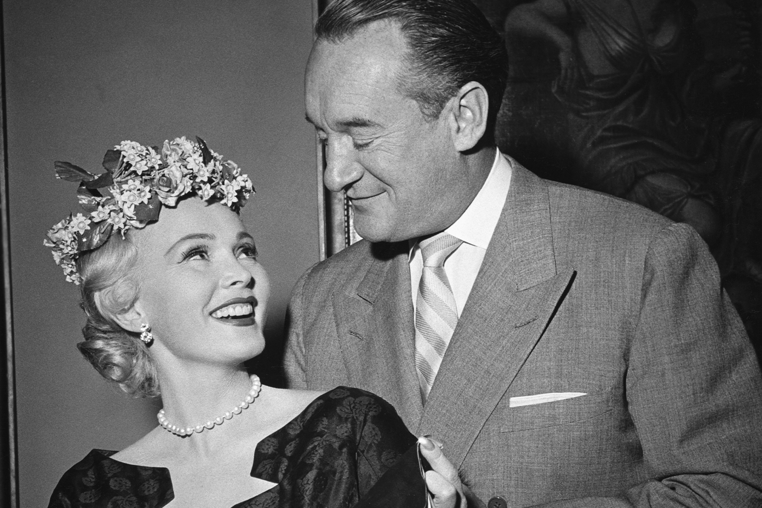 George Sanders And Zsa Zsa Gabor Looking At Each Other