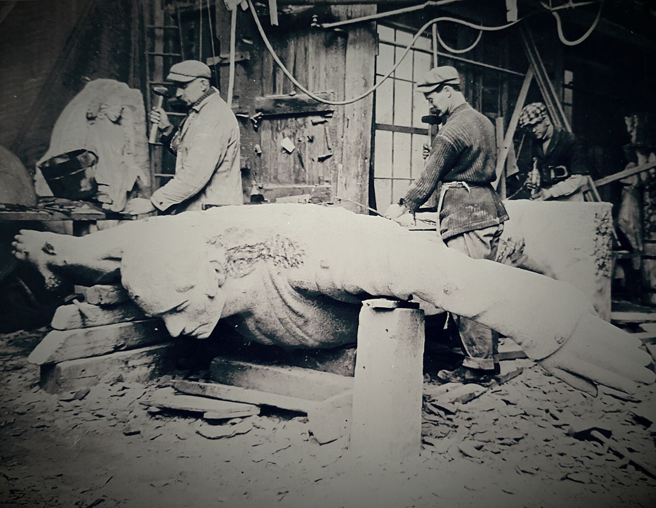 Stone masons work on the Titanic Memorial.- 1916