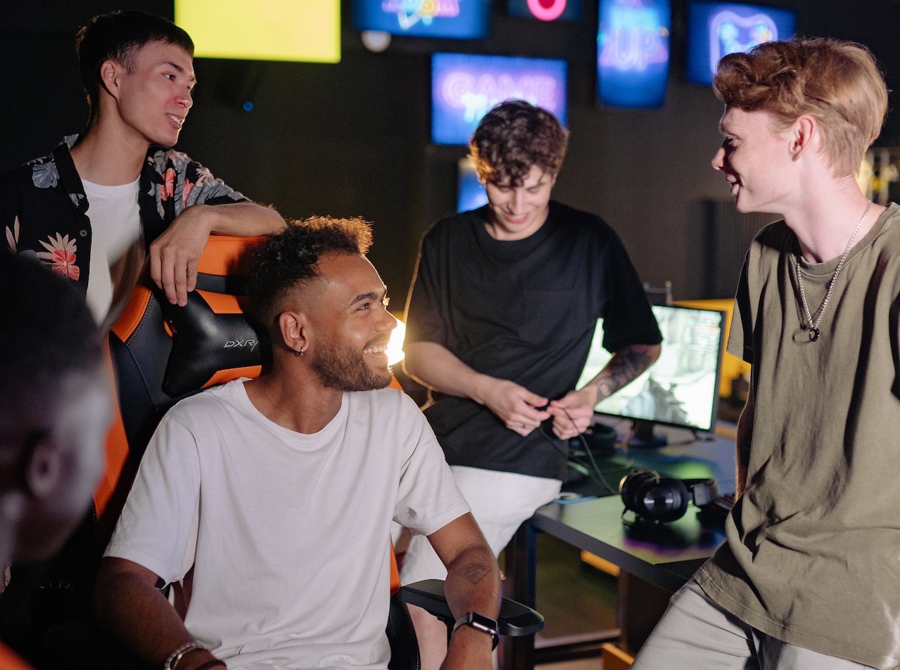 Group of young people are laughing, gaming and having fun.