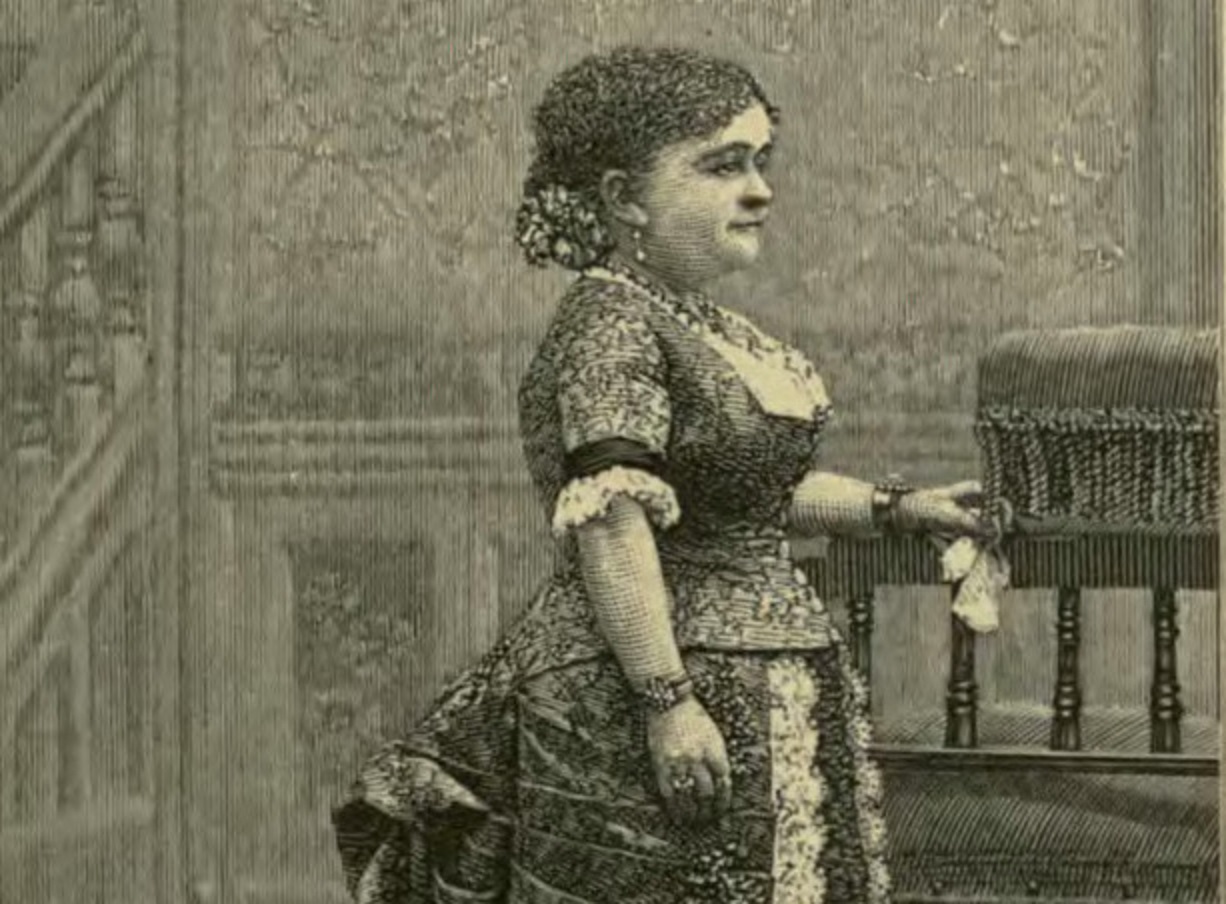 B&W image of Lavinia Warren wearing black dress and looking at side - 1891
