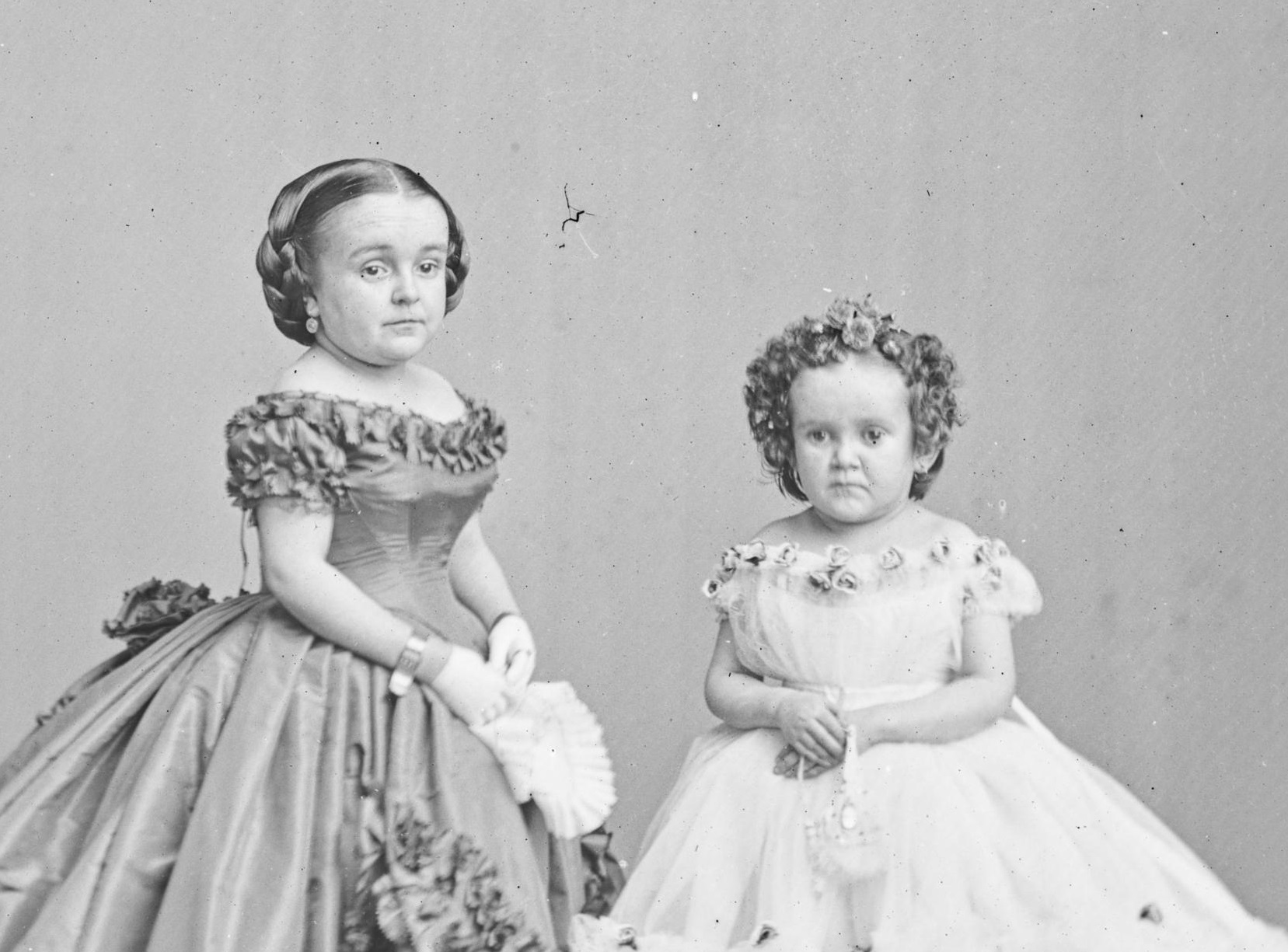 Lavinia Stratton and Minnie Warren looking at camera - 1860s