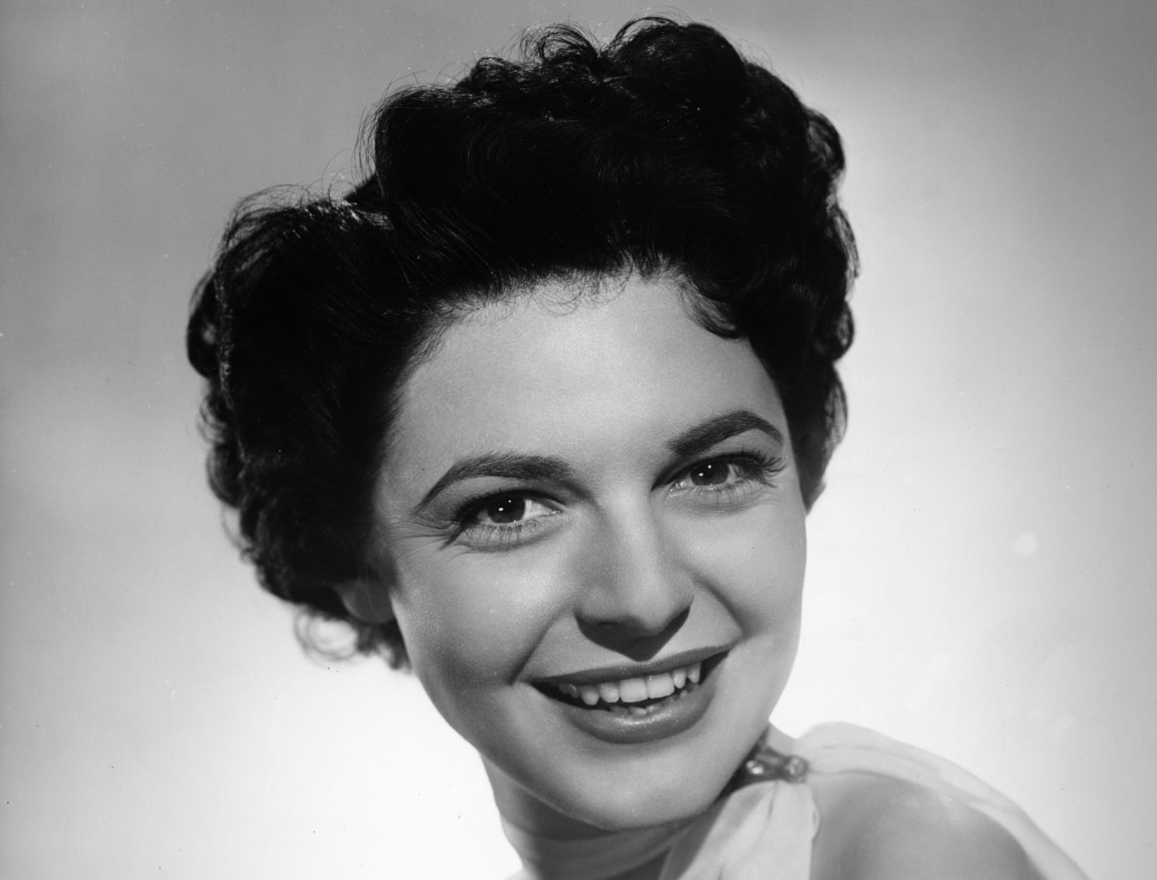 B&W photo of Anne Bancroft looking at camera - 1952