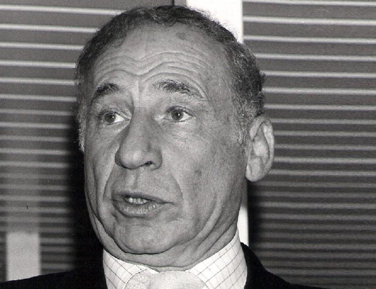 B&W photo of Mel Brooks looking with surprised face and talking - 1984