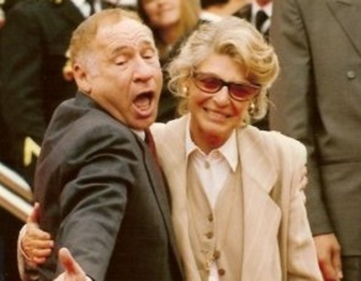 Mel Brooks and his wife Anne Bancroft hugging and smiling to people - 1991