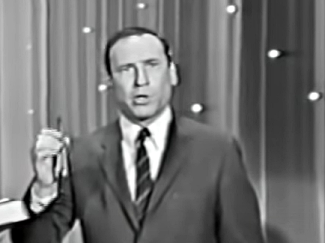 B&W Screenshot: Mel Brooks is talking and looking at side - from Mel Brooks-Unwrapped (2018)